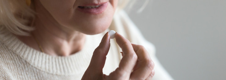 Woman taking medication